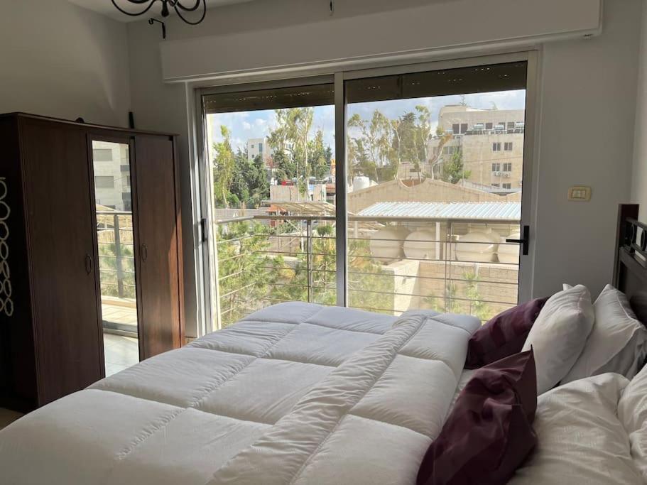 Ronza Elegant Apartment Аман Екстериор снимка